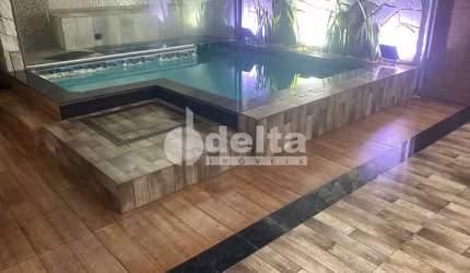 Casa residencial disponível para venda no bairro Jardim Inconfidência em Uberlândia-MG