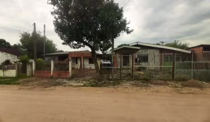 TERRENO COM 2 CASAS NA CECÍLIA