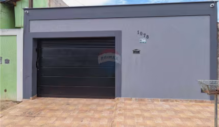 CASA a venda com 3 quartos e varanda com churrasqueira