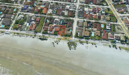 Terreno frente praia Enseada, murado