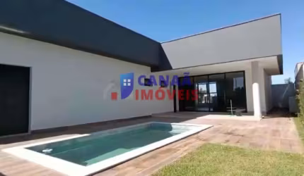 Arts Condomínio - Casa com  3 suites, piscina aquecida