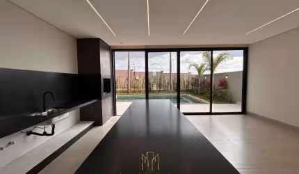 Casa de alto padrão no Condomínio Tamboré à venda em Uberlândia-MG: 4 quartos, 3 suítes, 2 salas, 4 banheiros, 4 vagas, 269,31 m².