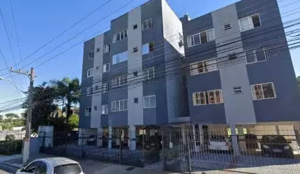 Apartamento com 02 dormitórios, sala, cozinha, banehiro e garagem.