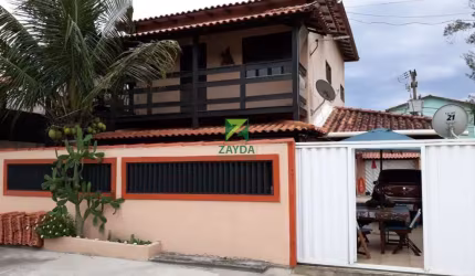 Casa à venda em Rio das Ostras-RJ: 6 quartos, 3 salas, 5 banheiros, 1 vaga de garagem no Jardim Campomar - 77,25 m².