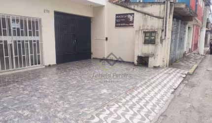 Casa com 3 dormitórios para alugar, 104 m² por R$ 6.230,00/mês - Centro - Suzano/SP