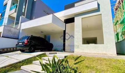 Casa com 3 dormitórios à venda, 150 m² por R$ 1.700.000,00 - Condomínio Aruã - Mogi das Cruzes/SP