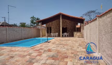 Excelente casa térrea com excelente acabamento à venda no bairro do Massaguaçu, em Caraguatatuba