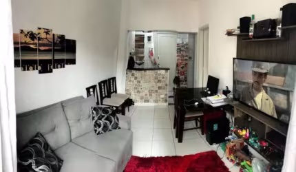 Um dormitório com portaria 24 horas, garagem e praia ao lado