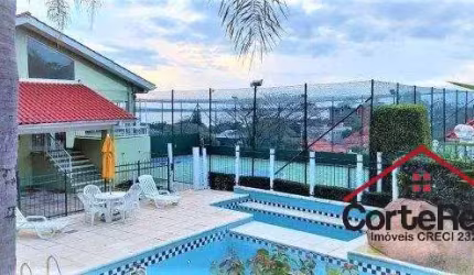 Casa em condomínio fechado à venda na Rua Padre João Batista Reus, 983, Vila Conceição, Porto Alegre por R$ 950.000
