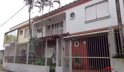 Casa com 6 quartos à venda na Rua Cícero Ahrends, 345, Menino Deus, Porto Alegre por R$ 1.300.000