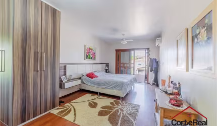 Casa com 3 quartos à venda na Rua Padre Alois Kades S J, 310, Jardim Europa, Porto Alegre por R$ 1.360.000