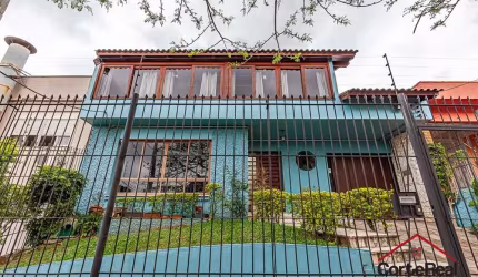 Casa com 5 quartos à venda na Avenida Engenheiro José Maria de Carvalho, 94, Vila Ipiranga, Porto Alegre por R$ 1.190.000