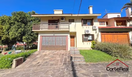Casa com 3 quartos à venda na Praça São Caetano, 90, Teresópolis, Porto Alegre por R$ 1.280.000