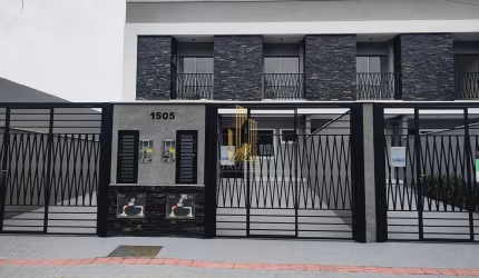 Sobrado 2 Suites 2 Vagas de garagem em Itapema