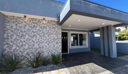 Casa 3 Dormitórios à venda no Bairro Centro com 129 m² de área privativa - 2 vagas de garagem