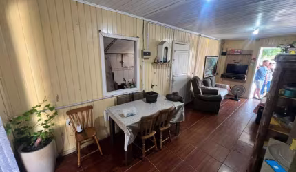 Casa 2 Dormitórios à venda no Bairro Centro com 110 m² de área privativa