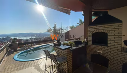 Casa com 4 quartos à venda na Rua Aldo Luz, 200, Itaguaçu, Florianópolis por R$ 2.200.000