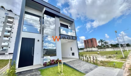Casa em condomínio fechado com 3 quartos à venda na Avenida Wilson Castelo Branco, 389, Deltaville, Biguaçu por R$ 1.149.000