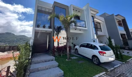 Casa em condomínio fechado com 3 quartos à venda na Avenida Deltaville, 132, Beira Rio, Biguaçu por R$ 1.090.000