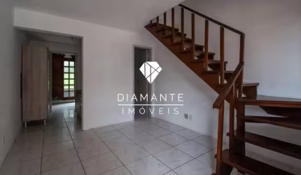 Casa em condomínio fechado com 2 quartos à venda na Rua Atílio Supertti, Vila Nova, Porto Alegre por R$ 175.000