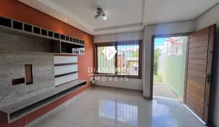 Casa com 2 quartos à venda na Rua Heitor Kramer, Guarujá, Porto Alegre por R$ 447.000