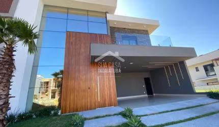 Sobrado moderno em condomínio fechado com 4 suítes e piscina