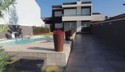 Sobrado com 4 dormitórios à venda, 164 m² por R$ 1.690.000,00 - Balneário Praia Grande - Matinhos/PR
