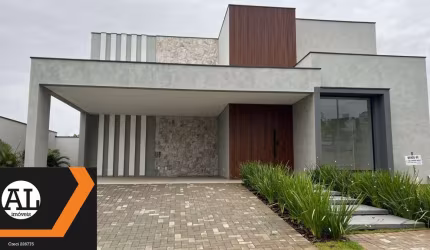 Casa à venda no condomínio Alphaville Esplanada 4 com uma bela piscina com borda infinita.