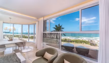 APARTAMENTO ALTO PADRÃO FINAMENTE MOBILIADO, EQUIPADO E DECORADO FRENTE MAR NA PRAIA BRAVA COM 04 SUÍTES E DEPENDÊNCIA.