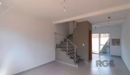 Casa Condominio em Porto Alegre, no bairro Vila Nova, com 2 dormitório(s), e 2 b