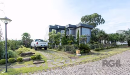 Casa em Condomínio 4 dormitórios à venda Vila Nova Porto Alegre/RS