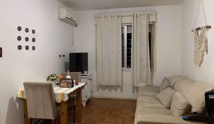 Apartamento de 2 dormitórios, living, cozinha, área de serviço e banheiro social
