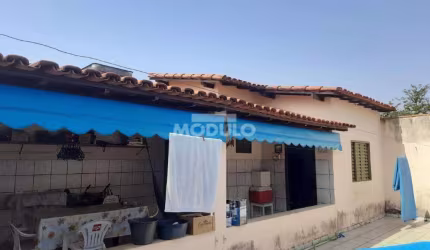 CASA RESIDENCIAL à venda, 3 quartos, 1 suíte, 3 vagas, Santa Mônica - Uberlândia/MG