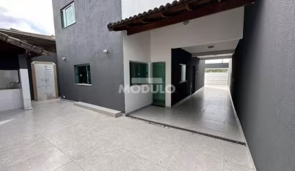 Casa residencial para locação, bairro Santa Mônica com 3 quartos
