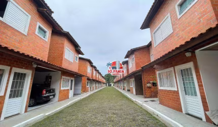Sobrado com 3 dormitórios à venda, 99 m² por R$ 320.000,00 - Vila São Paulo - Mongaguá/SP