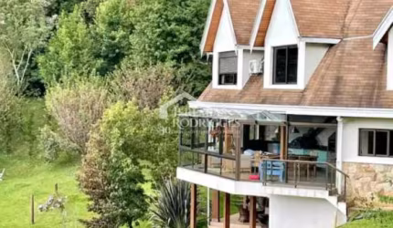 Casa com 5 dormitórios, 520 m² - Condomínio Pedra do Fogo - Campos do Jordão/SP