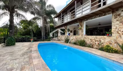 Casa com 4 dormitórios, 360 m² - Condomínio Chácaras Cataguá- Taubaté/SP