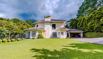 Casa com 6 suítes, 700 m² - Condomínio Vila Simonsen - Campos do Jordão/SP.