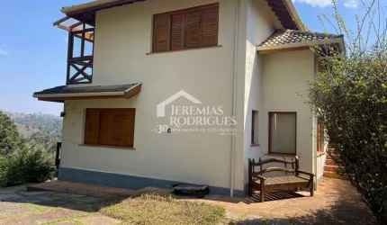 Casa com 3 suítes, 332 m² - Condomínio Florestal Clube - Campos do Jordão/SP.