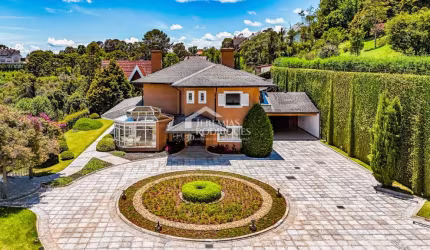 Casa com 4 suítes, 670 m² - Alto do Capivari - Campos do Jordão/SP.