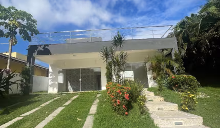 Casa a venda em Alphaville Litoral Norte 1 com 4 suites piscina e area gourmet