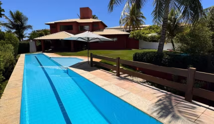 Casa a venda no cond praia dos lagos com 4 suites mobiliada e pé na areia
