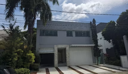 Casa a venda em alphaville 1 com 4 suites piscina e área gourmet