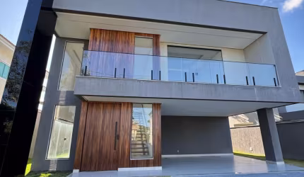 Casa a venda em alphaville litoral norte 1 com 4 suites e piscina