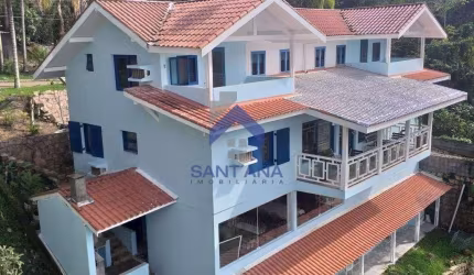 Casa em condomínio fechado com 5 quartos à venda na D, 473, Toninhas, Ubatuba por R$ 4.300.000