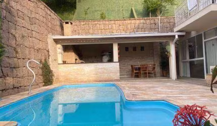 Casa com 4 suítes à venda, 338 m² no Condomínio Village Scorpios  por R$ 1.700.000 - Alpes dos Araçás (Jordanésia) - Cajamar/SP.