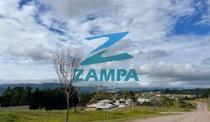 TERRENO DE 868M² COM LEVE ACLIVE NO CONDOMÍNIO TERRAS DA ALVORADA NO MEDEIROS