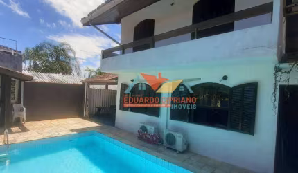 Casa com 3 dormitórios à venda, 180 m² por R$ 780.000,00 - Massaguaçu - Caraguatatuba/SP