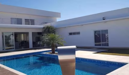 Casa de condomínio para venda com 449 metros quadrados com 5 quartos