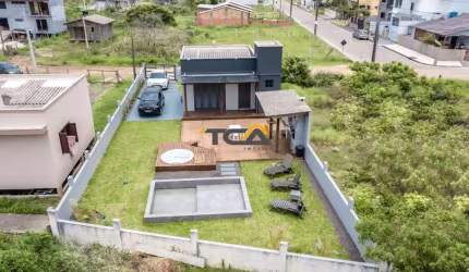 casa centro Passo de Torres, próximo a ponte de concreto.
